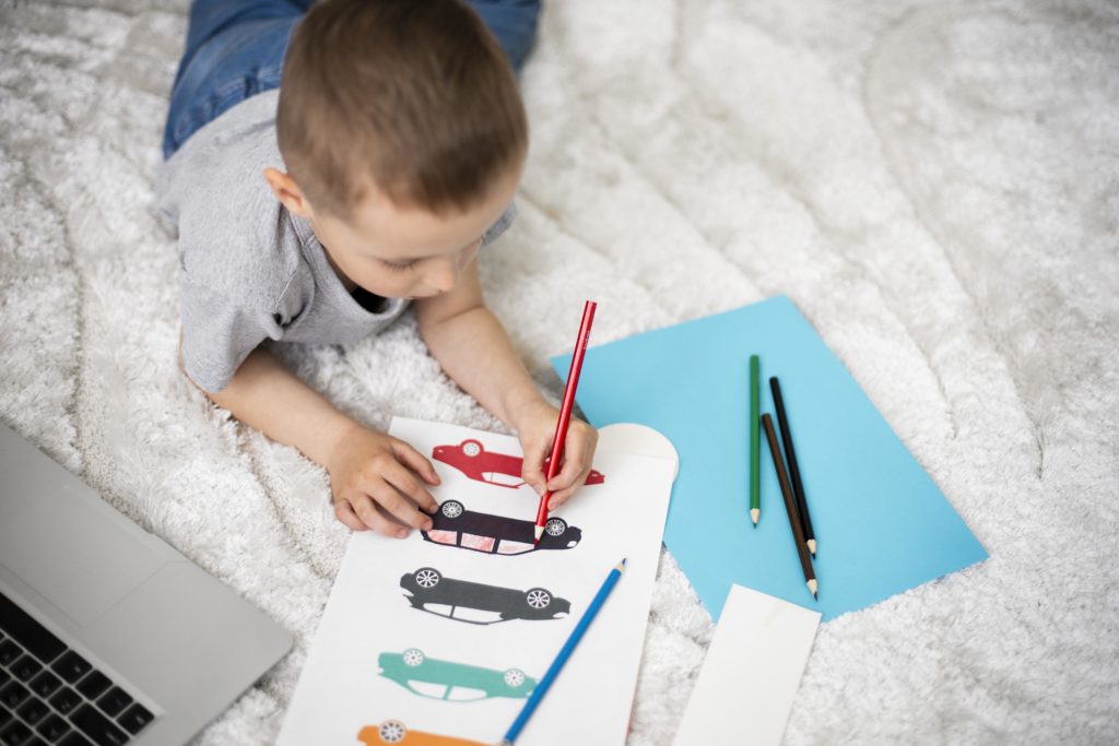 little boy coloring